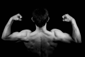 Man Flexing Muscles in Black and White Picture Stem Cell Therapy 